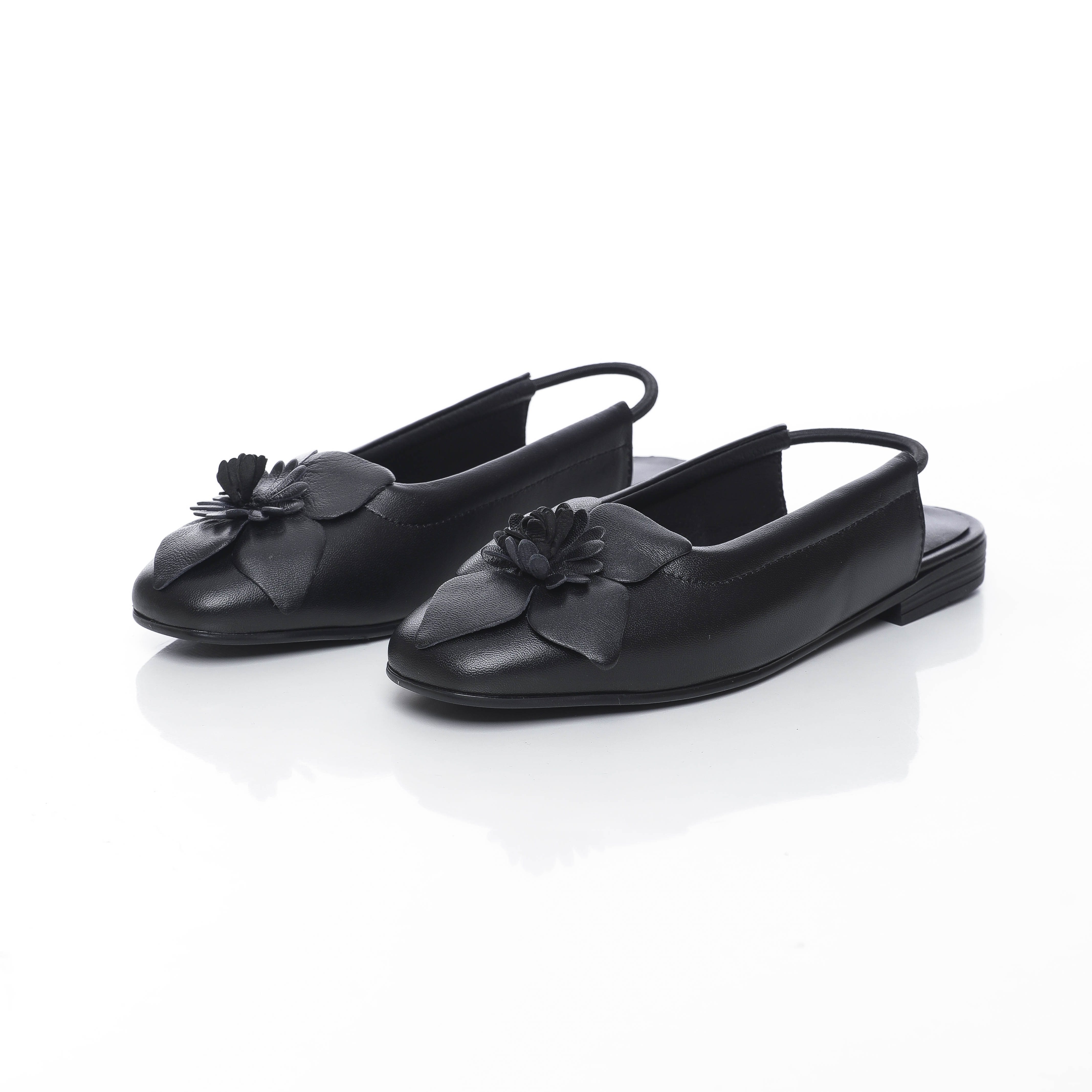 ballerines en cuir souple avec détail floral